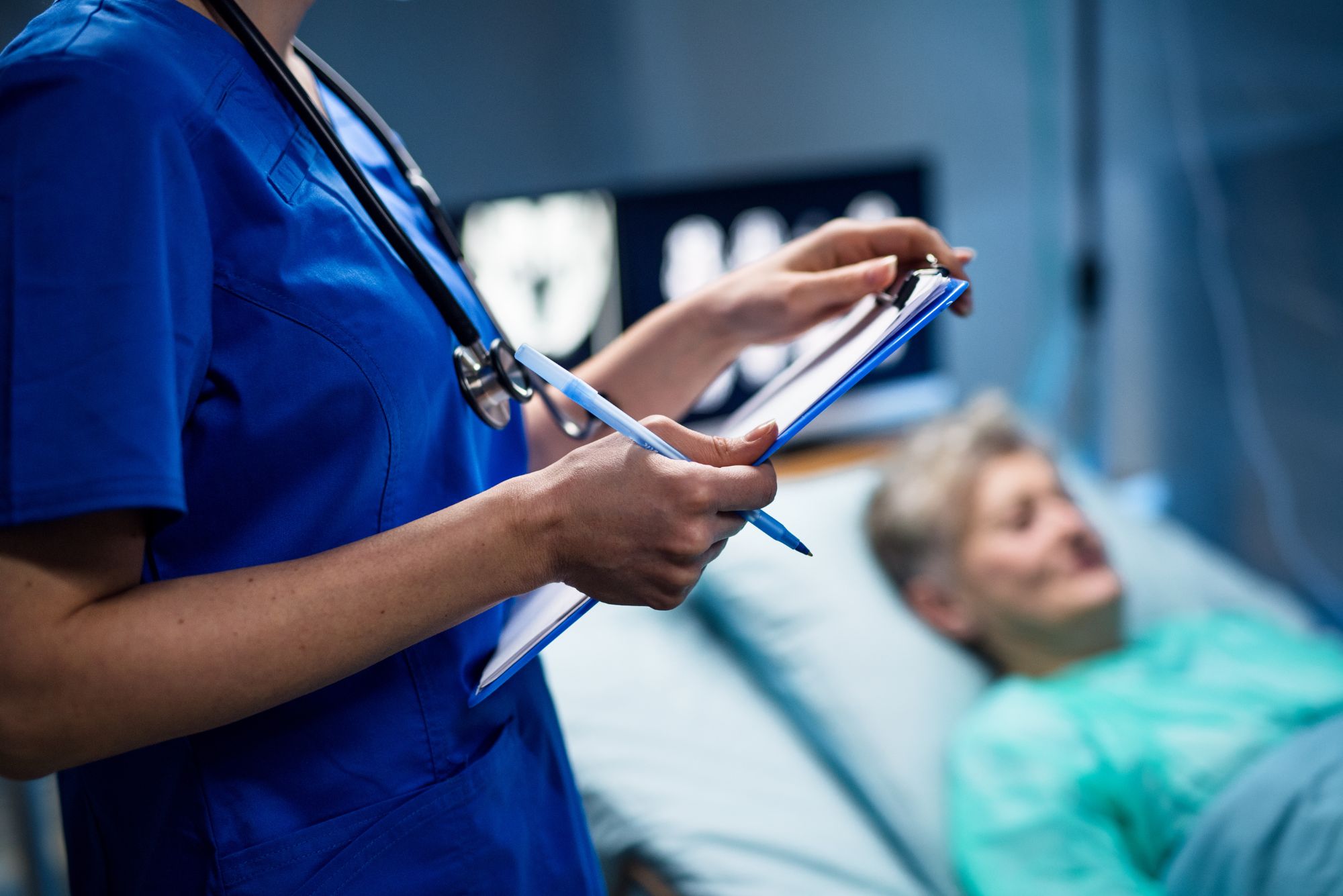 A doctor is slowed down because her hospital needs to improve their slow patient intake process.